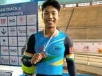 Ronaldo Singh celebrates his bronze medal in time trial at the IG Stadium on Monday