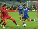 Hong Kong defenders try to stop Ashique Kuruniyan during AFC Asian Cup 2023 Qualifiers(PTI) Hong Kong defenders try to stop Ashique Kuruniyan during AFC Asian Cup 2023 Qualifiers(PTI)