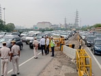 Bharat Bandh-Agnipath stir: Police personnel check vehicles ahead of the Congress' protest, in Gurugram, Monday, June 20, 2022. (PTI Photo)(PTI) Bharat Bandh-Agnipath stir: Police personnel check vehicles ahead of the Congress' protest, in Gurugram, Monday, June 20, 2022. (PTI Photo)(PTI)