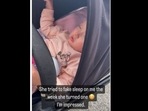 The toddler pretended to sleep when her mother checked in on her in the stroller. (jeannamarie53/Instagram) The toddler pretended to sleep when her mother checked in on her in the stroller. (jeannamarie53/Instagram)