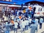 Youth Congress workers protesting in front of a train at Delhi's Shivaji Bridge railway station.&nbsp;