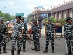 Central Reserve Police Force (CRPF) personnel stand guard outside Ranchi railway station during 'Bharat Bandh', in Ranchi, on June 20, 2022.&nbsp;