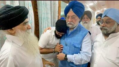 Union minister Hardeep Singh Puri condoles Kabul gurdwara attack victim Sawinder Singh’s family members in New Delhi on Monday. (ANI Photo/Hardeep Singh Puri Twitter)