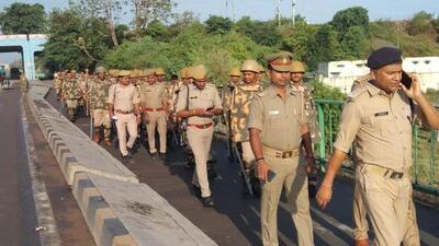 Police personnel staging a march in the Naini area of Prayagraj. (HT PHOTO) Police personnel staging a march in the Naini area of Prayagraj. (HT PHOTO)