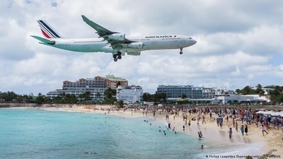 Although many long for a vacation, several factors have made it more challenging (Philipp Laage/dpa Themendienst/picture alliance ) Although many long for a vacation, several factors have made it more challenging (Philipp Laage/dpa Themendienst/picture alliance )