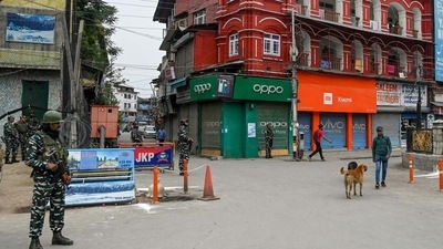 Indian paramilitary troopers stand guard near a closed market in Srinagar. (AFP) Indian paramilitary troopers stand guard near a closed market in Srinagar. (AFP)