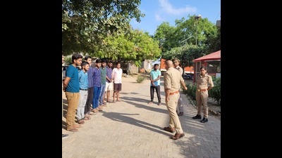 SO, Rajpur, Anurag Pandey, speaking to youths who are preparing to enter the armed forces, in Kanpur Dehat, on Monday. (HT Photo) SO, Rajpur, Anurag Pandey, speaking to youths who are preparing to enter the armed forces, in Kanpur Dehat, on Monday. (HT Photo)