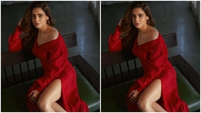 Coming to the design details, Aamna's bold red midi ensemble features a midi length hem. It has an off-the-shoulder detail on one side, a plunging V layover neckline, long billowy sleeves with cinched cuffs, a body-skimming silhouette accentuating her curvy frame and a long thigh-grazing slit on the side. (Instagram) Coming to the design details, Aamna's bold red midi ensemble features a midi length hem. It has an off-the-shoulder detail on one side, a plunging V layover neckline, long billowy sleeves with cinched cuffs, a body-skimming silhouette accentuating her curvy frame and a long thigh-grazing slit on the side. (Instagram)