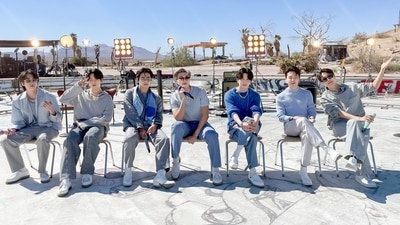 BTS members Jin, Jungkook, V, RM, Suga, Jimin, and J-Hope performed Proof Live.