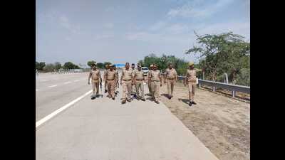 Mathura police on vigil on Yamuna Express Way on Monday in view of Bharat Bandh call given to oppose Agnipath scheme for new recruitment or Indian armed forces .