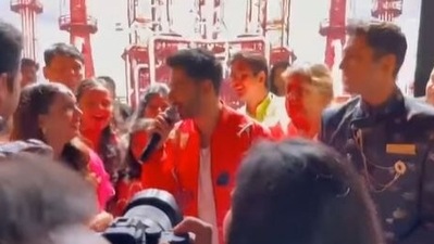 Varun Dhawan with a couple ahead of their wedding in Delhi.