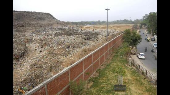 Two firms have been shortlisted by the MC for the for the removal of more than 7.5 lakh MT of legacy waste from the Dadumajra dumping site after the technical evaluation of five bids was completed here on Monday. The work allotment is expected within this week. (HT File Photo)