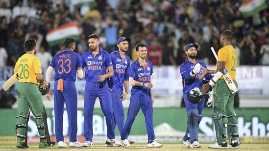 Indian and South African players greet each other