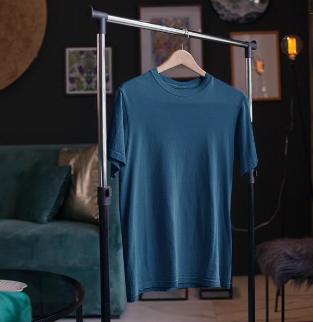 T-shirts are extremely versatile and can be mixed and matched with all your lowers. (Loose-fitting, round neck navy-blue t-shirt by The Mean Indian Store)