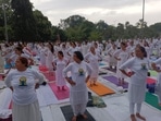 Residents performing yoga on the occasion of International Yoga Day at Ram bagh garden in Amritsar on Tuesday. Residents performing yoga on the occasion of International Yoga Day at Ram bagh garden in Amritsar on Tuesday.