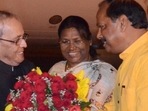 NDA's presidential nominee Droupadi Murmi (centre) with former President Pranab Mukherjee and ex-Jharkhand CM Raghubar Das. (File Photo/HT) NDA's presidential nominee Droupadi Murmi (centre) with former President Pranab Mukherjee and ex-Jharkhand CM Raghubar Das. (File Photo/HT)