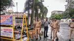 The Surat Police outside a hotel where Shiv Sena leader Eknath Shinde and a group of party lawmakers are camping (PTI) The Surat Police outside a hotel where Shiv Sena leader Eknath Shinde and a group of party lawmakers are camping (PTI)