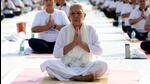 Uttar Pradesh governor Anandiben Patel doing yoga at Raj Bhavan in Lucknow on the occasion of International Yoga Day on Tuesday. (Deepak Gupta/HT Photo) Uttar Pradesh governor Anandiben Patel doing yoga at Raj Bhavan in Lucknow on the occasion of International Yoga Day on Tuesday. (Deepak Gupta/HT Photo)