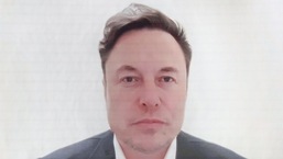 Elon Musk, CEO of Tesla Inc., appears via video link during the Qatar Economic Forum in Doha, Qatar, Tuesday, June 21, 2022. (Photographer: Christopher Pike/Bloomberg)