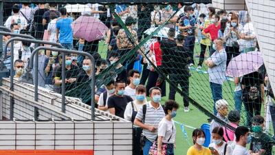 People queue for the mass coronavirus disease (COVID-19) testing in Macau, China. (REUTERS) People queue for the mass coronavirus disease (COVID-19) testing in Macau, China. (REUTERS)
