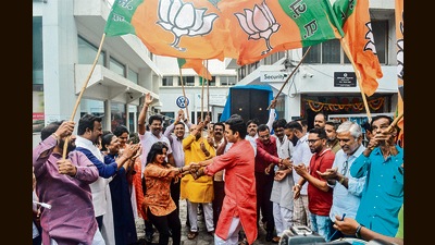 BJP officials celebrate with Jagdish Mulik (centre) at BJP city office on Tuesday. (Shankar Narayan/HT PHOTO) BJP officials celebrate with Jagdish Mulik (centre) at BJP city office on Tuesday. (Shankar Narayan/HT PHOTO)