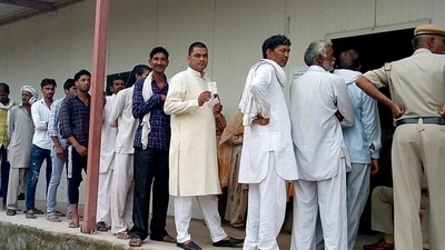 Voters stand in a queue during the polling process for municipal elections at Meham on Sunday. (Manoj Dhaka/Hindustan Times) Voters stand in a queue during the polling process for municipal elections at Meham on Sunday. (Manoj Dhaka/Hindustan Times)