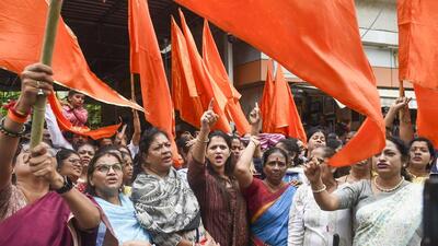 Shiv Sena supporters shouts slogan in support of chief minister of Maharashtra Uddhav Thackeray, outside Shiv Sena Bhavan, Shivaji Park in Mumbai on Tuesday. (PTI) Shiv Sena supporters shouts slogan in support of chief minister of Maharashtra Uddhav Thackeray, outside Shiv Sena Bhavan, Shivaji Park in Mumbai on Tuesday. (PTI)