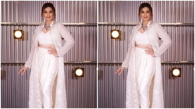 Styled by fashion stylist Romi Choudhury, Sonali wore her tresses into a messy bun with a middle part. (Instagram/@iamsonalibendre)