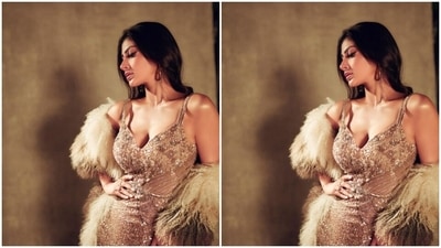 Mouni's sleeveless gown featured a plunging neckline. In a feather shrug, she added more sass to her look. (Instagram/@imouniroy)