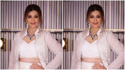 In statement blue earrings and a necklace from the houses of Mahesh Notandass and Vandals, Sonali accessorised her look. In statement white stilettoes, she completed her look for the day. (Instagram/@iamsonalibendre)