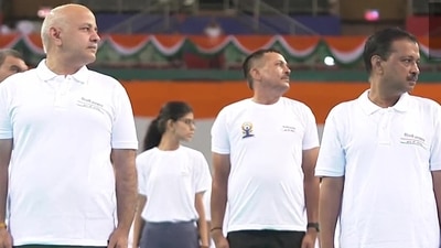 Delhi CM Arvind Kejriwal and Deputy CM Manish Sisodia take part in International Yoga Day celebrations at Thyagraj Stadium. Delhi CM Arvind Kejriwal and Deputy CM Manish Sisodia take part in International Yoga Day celebrations at Thyagraj Stadium.