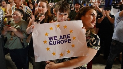 People rally in support of the Georgia's membership to the European Union, days after the European Commission recommended deferring the country's candidacy, in Tbilisi on June 20, 2022. (AFP) People rally in support of the Georgia's membership to the European Union, days after the European Commission recommended deferring the country's candidacy, in Tbilisi on June 20, 2022. (AFP)