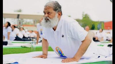 Haryana home and AYUSH minister Anil Vij during 8th International Yoga Day celebrations on Tuesday. (HT File)