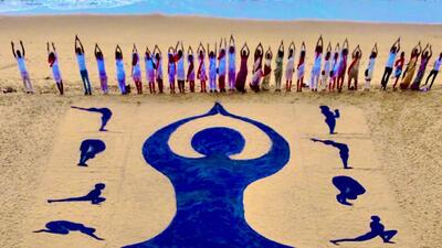 Art created by sand artist Sudarshan Patnaik in Odisha’s Puri on the occasion of International Yoga Day. (Twitter Photo) Art created by sand artist Sudarshan Patnaik in Odisha’s Puri on the occasion of International Yoga Day. (Twitter Photo)