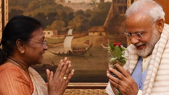 BJP's Presidential candidate Droupadi Murmu with PM Narendra Modi. (Twitter@droupadi_murmu)