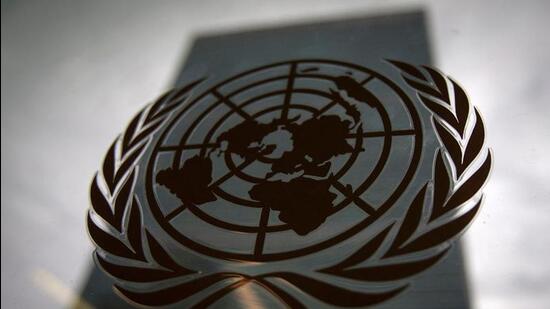 FILE PHOTO: The United Nations headquarters building is pictured though a window with the UN logo in the foreground in the Manhattan borough of New York August 15, 2014. REUTERS/Carlo Allegri (REUTERS)