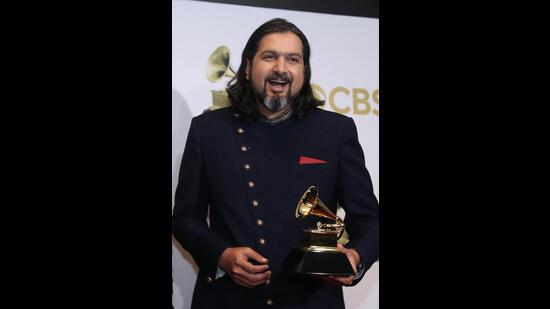 Ricky Kej pose with his Grammys for New Age Album at the 64th Annual Grammy Awards at the MGM Grand Garden Arena (REUTERS/Steve Marcus)