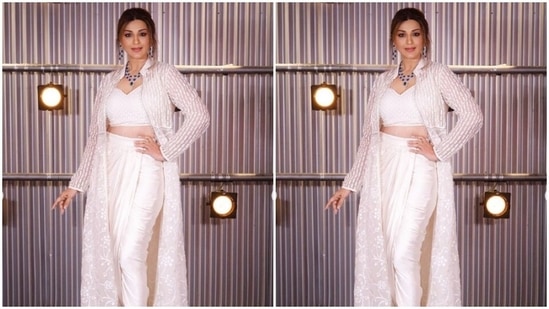 Styled by fashion stylist Romi Choudhury, Sonali wore her tresses into a messy bun with a middle part.(Instagram/@iamsonalibendre)