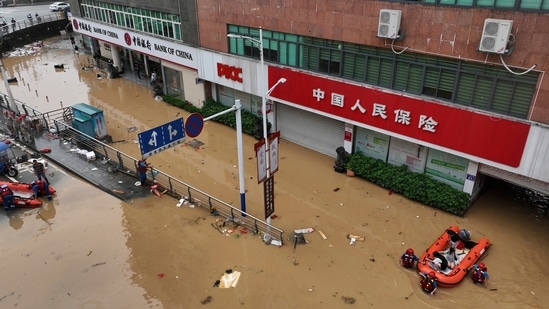 In this photo released by Xinhua News Agency, aerial photo shows rescuers evacuate people stranded after flooding caused by heavy rain in the city of Jian'ou in southeast China's Fujian Province. (File image)(AP) In this photo released by Xinhua News Agency, aerial photo shows rescuers evacuate people stranded after flooding caused by heavy rain in the city of Jian'ou in southeast China's Fujian Province. (File image)(AP)