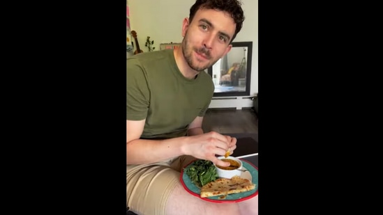 The French man tells his Indian wife he is eating a ‘pamatha’ in this viral Instagram video. (Instagram/@sharumulla)