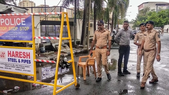 Surat: Police outside a hotel during meeting of Maharashtra's MPs and MLAs, in Surat, Tuesday, June 21, 2022. (PTI Photo) Surat: Police outside a hotel during meeting of Maharashtra's MPs and MLAs, in Surat, Tuesday, June 21, 2022. (PTI Photo) 