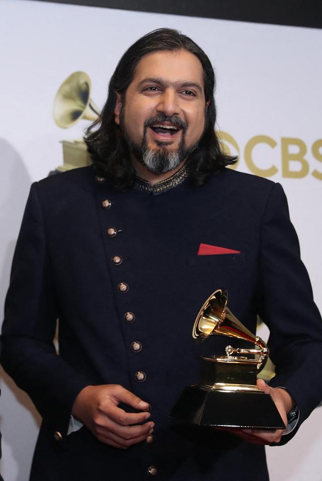 Ricky Kej pose with his Grammys for New Age Album at the 64th Annual Grammy Awards at the MGM Grand Garden Arena (REUTERS/Steve Marcus)