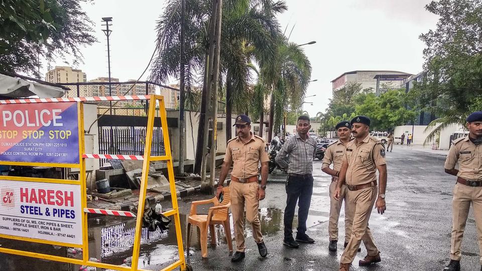 The Surat Police outside a hotel where Shiv Sena leader Eknath Shinde and a group of party lawmakers were camping. (PTI) The Surat Police outside a hotel where Shiv Sena leader Eknath Shinde and a group of party lawmakers were camping. (PTI)