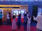 Children follow Prime Minister’s yoga animation postures.(HT Photo) Children follow Prime Minister’s yoga animation postures.(HT Photo)