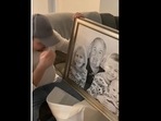 A screengrab of the video of a man who got emotional on seeing his late father's portrait along with his grandkids. (paintyourlife/Instagram) A screengrab of the video of a man who got emotional on seeing his late father's portrait along with his grandkids. (paintyourlife/Instagram)