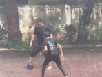 Aamir Khan and Azad Rao playing football amid heavy downpours in Mumbai. Aamir Khan and Azad Rao playing football amid heavy downpours in Mumbai.