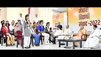 Uttar Pradesh CM Yogi Adityanath interacting with meritorious students of UP Board at his official residence in Lucknow on Wednesday (Sourced)