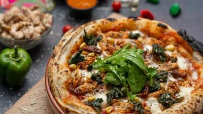 Greens like kale, baby spinach and rocket leaves have replaced traditional pizza toppings. Greens like kale, baby spinach and rocket leaves have replaced traditional pizza toppings.