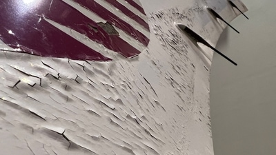 Surface damage seen on Qatar Airways' airbus A350 parked at Qatar airways aircraft maintenance hangar in Doha, Qatar, June 20, 2022. Picture taken June 20, 2022. REUTERS/Imad Creidi (REUTERS)