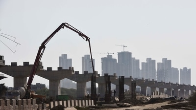 A view of the high rise buildings in the backdrop of under construction flyover on Dwarka Expressway in Gurugram, India. (Photo by Vipin Kumar / Hindustan Times) (Vipin Kumar /HT PHOTO)